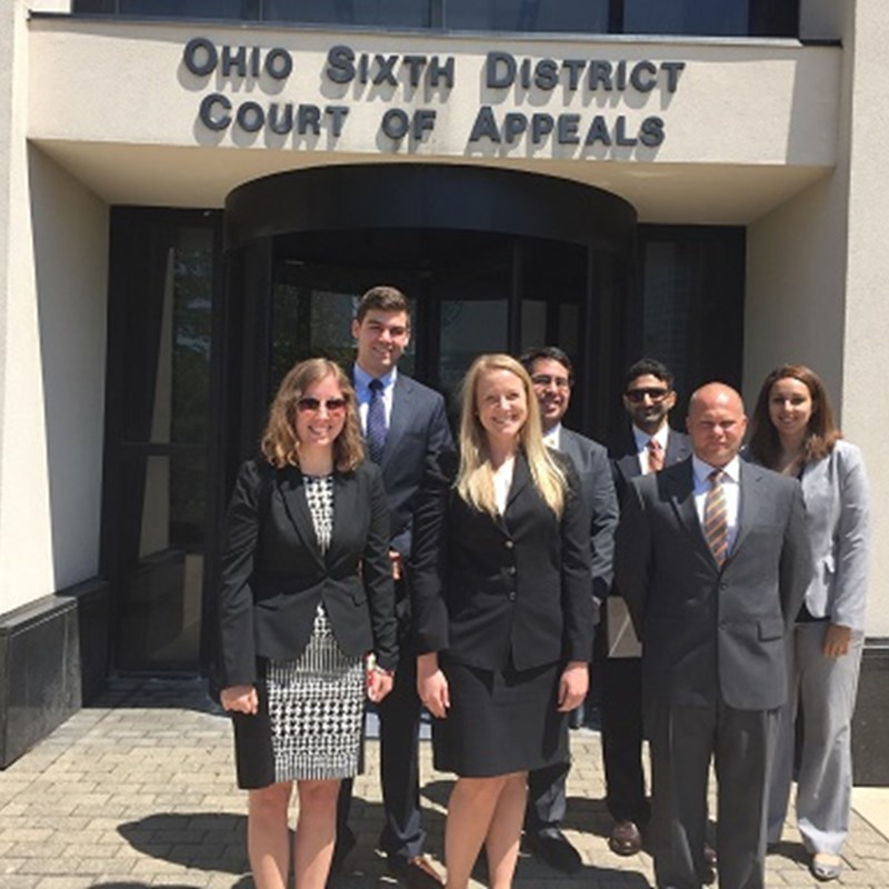 seven Summer Associates standing in front of Ohio Sixth District Court of Appeals building